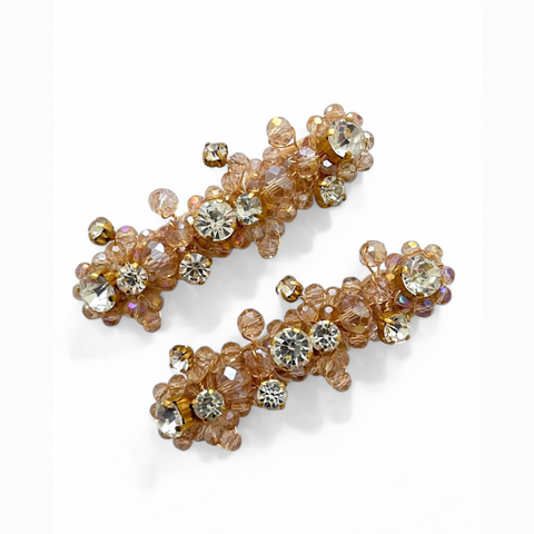 Close-up of the Andrea Crystal Flowers and Rhinestone Hair Clips in Blush, showcasing handcrafted floral designs with sparkling crystals.