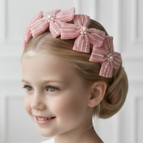 Girls Handbeaded bespoke bow headband.  Pink crystals and Pearls.  created by Sienna Likes to Party Luxury accessories for children.