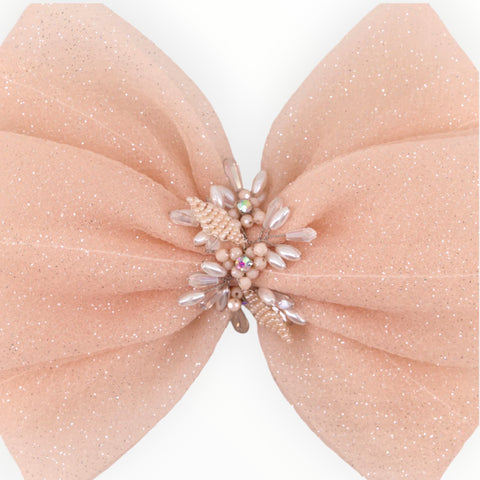 Best designer handmade hair bows in pale apricot.  Perfect for childrens special occasions, gift giving and weddings.