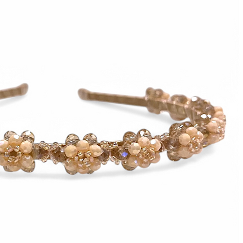 The Pansie flower headband is handcreafted with different sized quality blush crystals and pearls and highlighted .  The Perfect childs hair Accessory for special occasionwear, kids birthday parties, weddings and flower girls