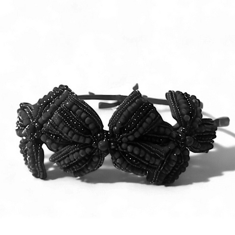 Buy the best luxury girls hairbow headband.  This designer kids hair accessory is entirely handmade with jet black crystals of varying sizes.  A beautiful special occasion headband for mini fashionistas