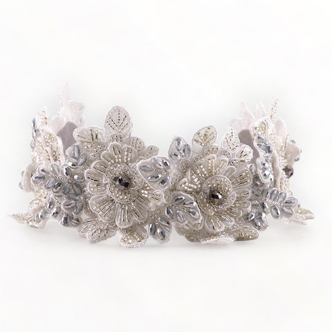 Young girl wearing the Hadraniel Silver Embellished Headband, ideal for communions and special occasions.
