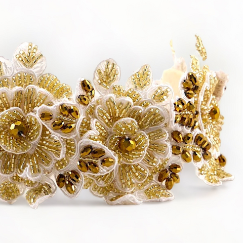 White and gold flower girl headband styled for a wedding by Sienna Likes to Party