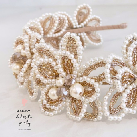 Close up of Girls blush pearl and crystal flower crown perfect for bridal and kids special occasionwear
