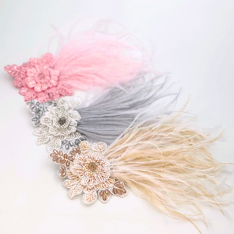 Designer Girls Hair Clips - hand beaded in soft pastel colours, each highlighted with soft feathers.  Created by Sienna Likes to Party