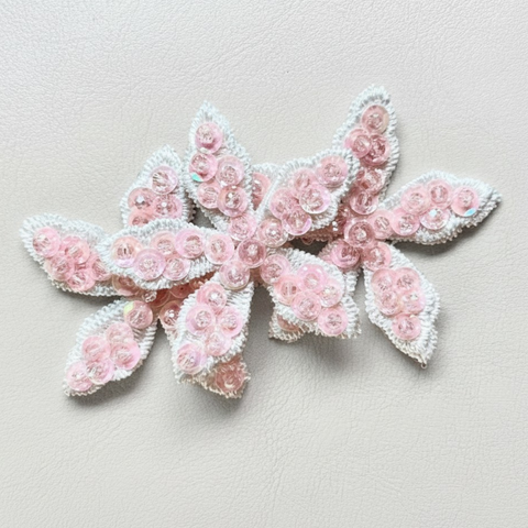 Designer girls flower hair clip with three white lace flowers with pastel pink sequin and crystal hand embelishment by Sienna Likes to Party