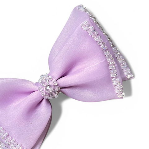 Elegant hair accessory for girls with sparkling crystal details.  The Adelia bow childs hair clip is designed and entirely handmade by Sienna Likes to Party, luxury hair accessories for children