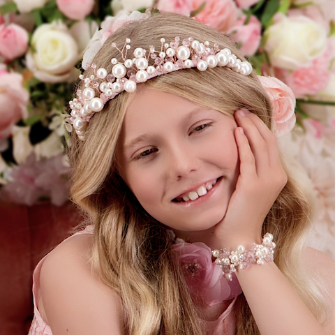 Designer Princess Crown by Sienna Likes to Party Kids hair accessories.  This unique childs tiara is handcrafted with pastel pink pearls and crystals.  Perfect for special occasions