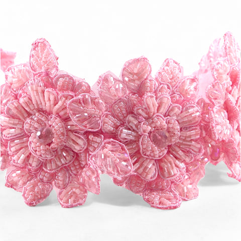 The most highly embelished flower crown, hand beaded with hundreds of pink crystal and pearl beads.  Perfect for childrens special occasions.  Designed by Sienna Likes to Party, luxury girls bespoke fashion accessories