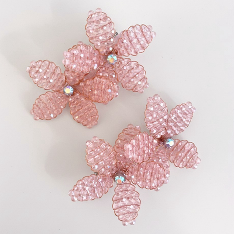 Designer individually hand beaded pink crystal hair clip set for girls.  Pale pink crystal beads centred with rainbow diamantes.