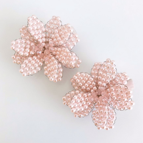 Designer childrens pink flower hair clip set.  Handmade with dozens of pink pearl beads and centered with pink crystals.  Created by Sienna Likes to Party