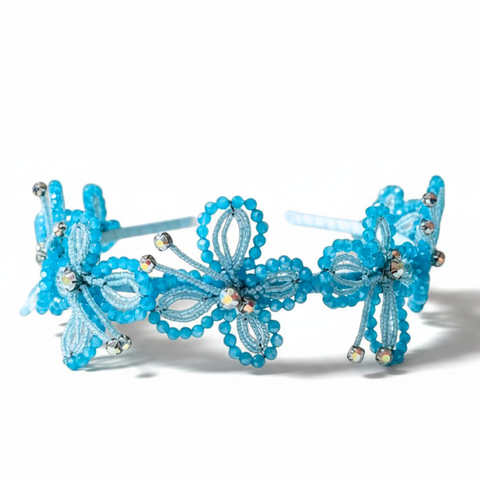 Handmade turquoise blue butterfly headband individually handmade with crystals and highlighted with diamantes.