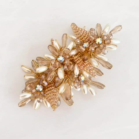 Designer flower girl hair clip in blush crystals, pearl beads and rainbow rhinestones in a floral design by Sienna Likes to Party