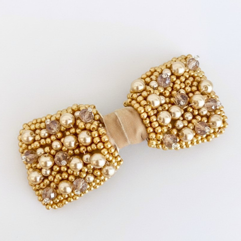 Designer childrens gold crystal and pearl bow hair clip with pearl highlights.  Hand beaded by Sienna Likes to Party - Luxury Hair accessories for children