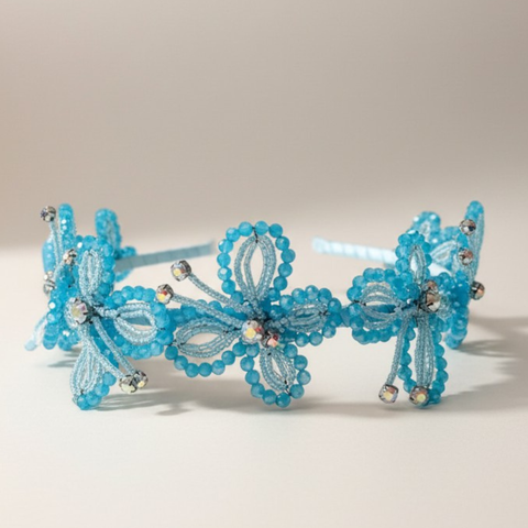 Bespoke turquoise butterfly headband for girls individually handmade with crystals and embroidery for luxury parties and weddings