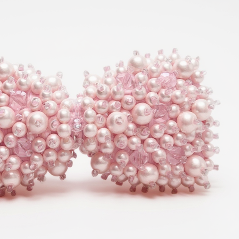 Pink bow hairclip for girls - handmade with pearls and crystals, perfect for childrens special occasionwear.
