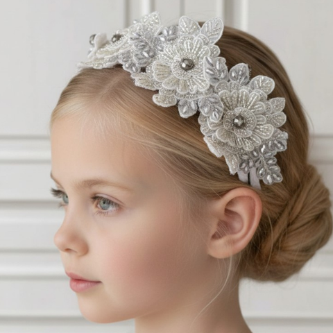 Designer girls hand beaded flower crown.  Handmade with silver and white crystals to create a stunning show stopping special occasion headband for girls by Sienna Likes to Party Accessories