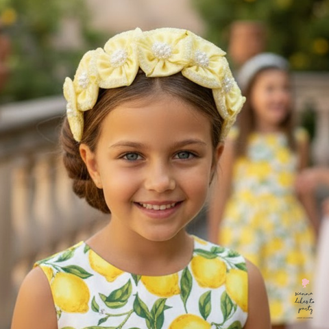 girl wearing lemon flower crown at summer birthday party