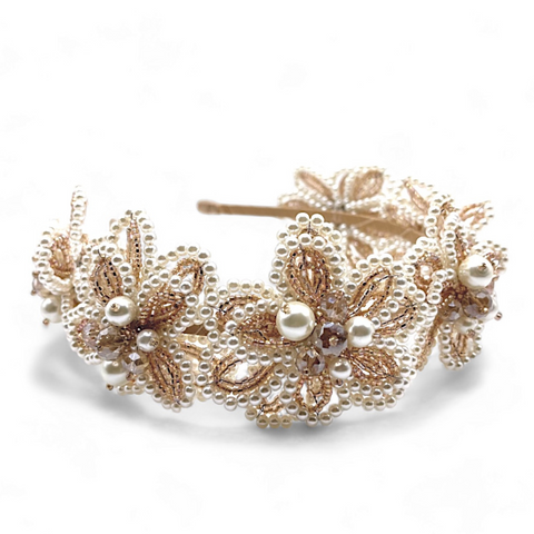 Handcrafted blush flower crown headband adorned with pearls and crystals, ideal for flower girls and special occasions.