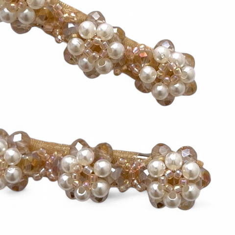 The Pansie elegant girls hair clip set.  These two unique flower clips are handmade with luxury blush crystals and highly embelished with ivory pearls for added style.  Perfect for weddings, bridal and kids birthday parties