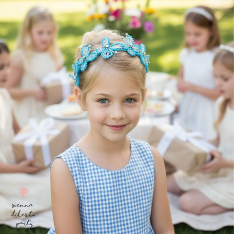 Sparkling turquoise butterfly headband for girls with bespoke handmade detailing and elegant special occasion styling