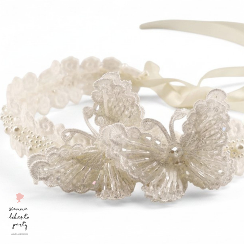 close up of luxury designer handmade butterfly hair garland for girls in ivory - sienna likes to party
