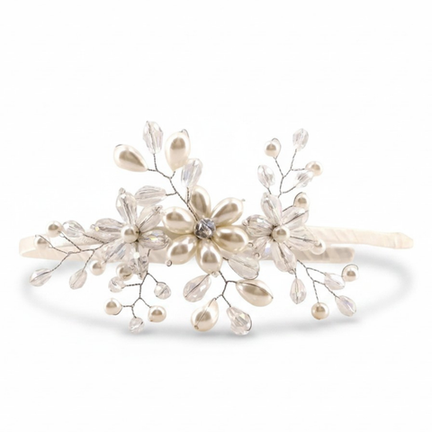 Designer Ivory bridal flower headband handmade with pearls and clear cut crystals in a flower design.  Perfect bespoke piece for bridesmaids and flower girls.