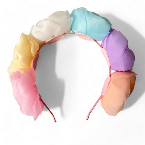 close up of handmade floral headband with delicate pastel flowers and pearl detailing for girls