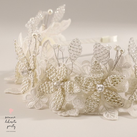 Luxury girls wedding headband with intricate pearl floral detailing