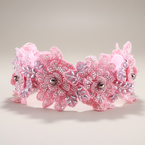 Close-up of silver crystals on the pink Hadraniel couture flower headband
