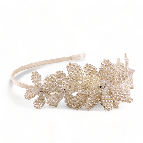 Best designer flower girl pearl hair accessories.  Handmade flowers made from ivory pearls and clear crystals are attached to an ivory satin headband.  Designed by Sienna Likes to Party, perfect for Flower Girls, bridal and special occasions