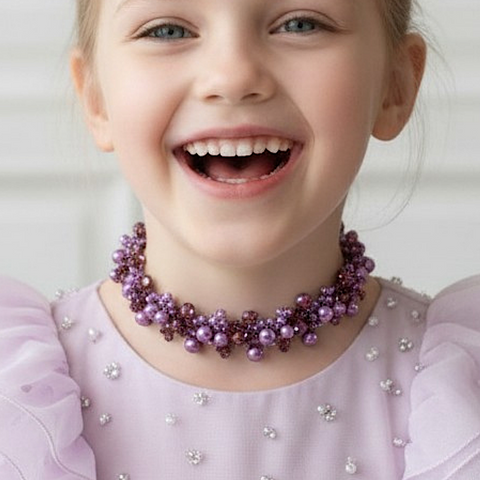 Model wearing Designer handmade crystal and pearl necklace - lilac crystal and pearl choker style.  Created by Sienna Likes to Party Luxury Accessories for Children