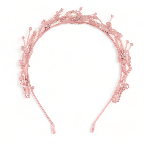 Designer Girls Pink Butterfly Crown in pale pink.  This headband is meticulously hand crafted with sparkling pastel pink crystals by Sienna Likes to Party Brand