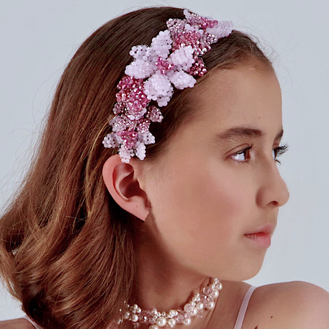 Luxury Designer Hair Accessories and jewelry for Children by Sienna Likes to Party.  The model wears the Roseangel crystal flower crown made by hand.