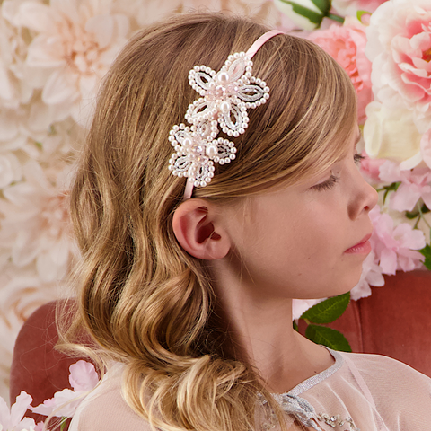 Buy the best luxury childs headband. 
uniquely handmade flowers from pearl and cut crystal beads adorn a satin headband.  perfect for special occasions.  Worldwide shipping