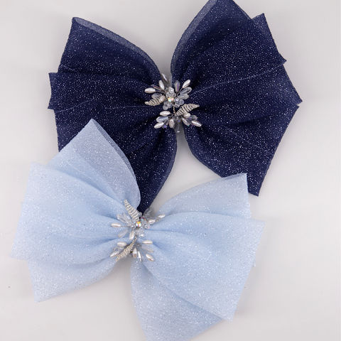 Blue hair accessories for children by Sienna Likes to Party.  The handmade luxury Galena  hair bow is uniquely hand stitched with crstyals and pearls to create the perfect bespoke kids gift or accessory for birthday parties.