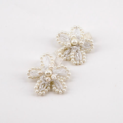 Buy best ivory pearl and crystal flower hair clip set, bespoke and entirely handmade by Sienna Likes to Party luxury kids fashion accessory brand.