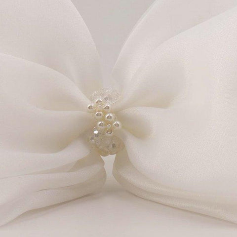 The Angel Wings White Bow Headband.