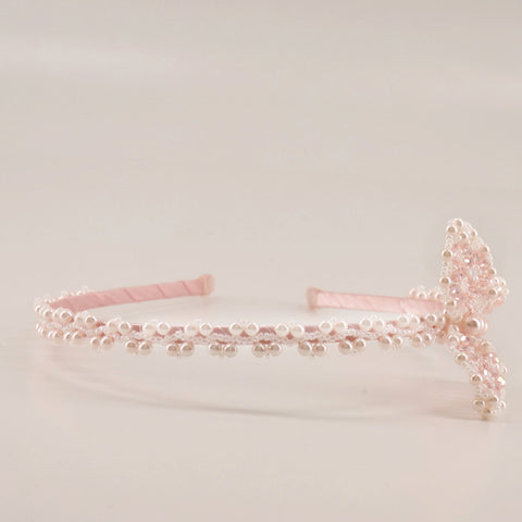 The Calisto Pearl Butterfly Headband.