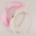 The Cassiel Girls Designer Feather Hair Bow headband.
