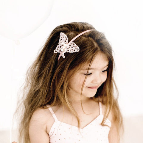 The Flutter Me Pink Butterfly Crystal Designer Headband.