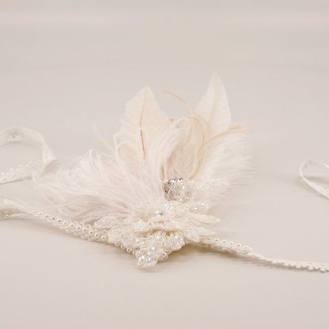 The Joetta Feather Designer Hair Garland.