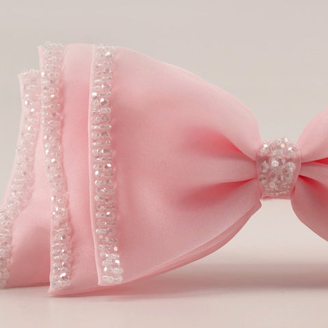 The Sugar Plum Bow Designer Hair Clip.