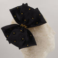 The Vevina Statement Bow Hair Clip.