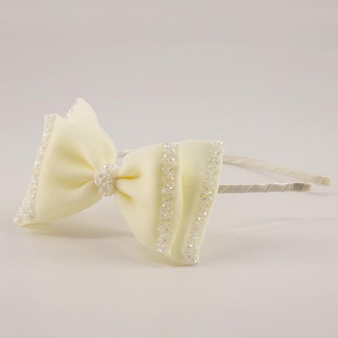 The Wonderland Designer Hair Bow Headband.